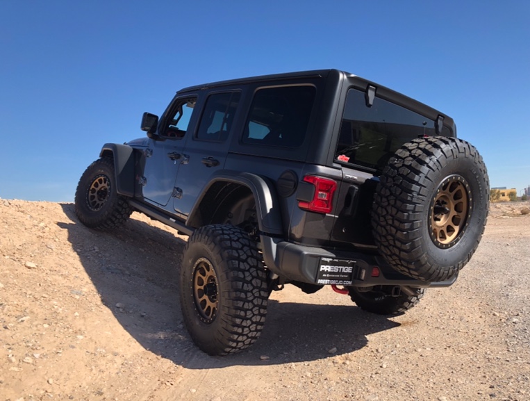 lifted JK Wrangler 2014 Dune color with Atlas bumpers from DSI